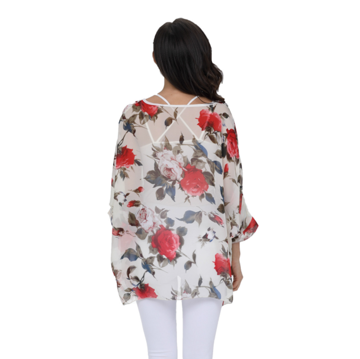 Back view of a women's lightweight floral chiffon blouse featuring a red and pink rose print, sheer fabric, and crossover strap detailing. Perfect for spring and summer outfits.