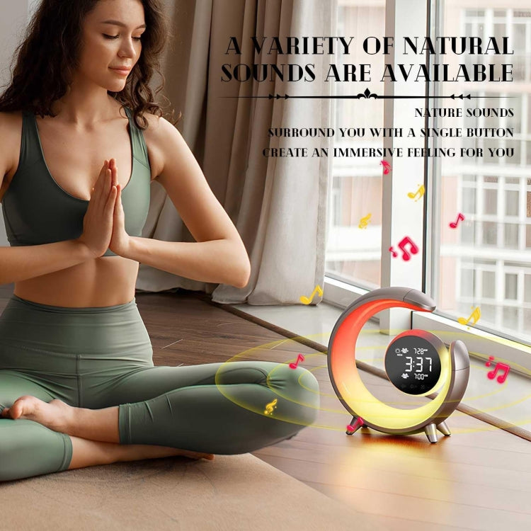 Woman meditating near a crescent-shaped alarm clock with soothing natural sounds and ambient LED light, ideal for yoga, mindfulness, and wellness routines