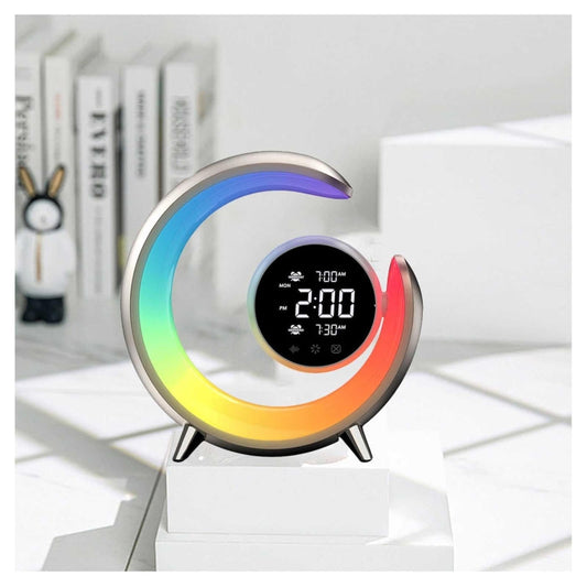 Modern crescent moon-shaped LED alarm clock with multicolor ambient light, digital display showing time, weather, and dual alarms, perfect for bedroom or home office decor.