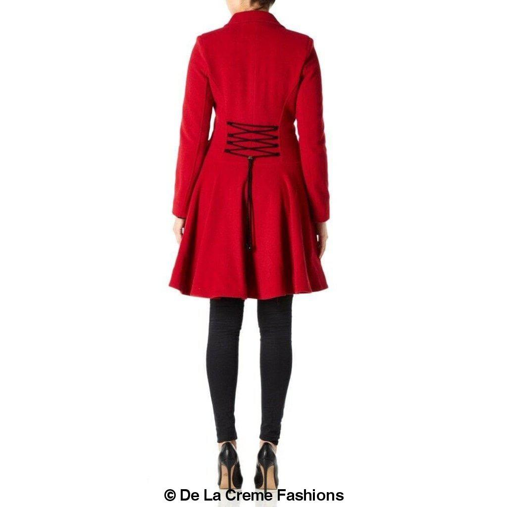 Back view of women's red fit-and-flare wool coat by De La Creme Fashions – features elegant corset-style lace-up detail and flared hemline, modeled with black leggings and heels